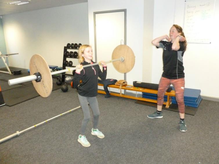 Sarah Owens teaching a lifting technique